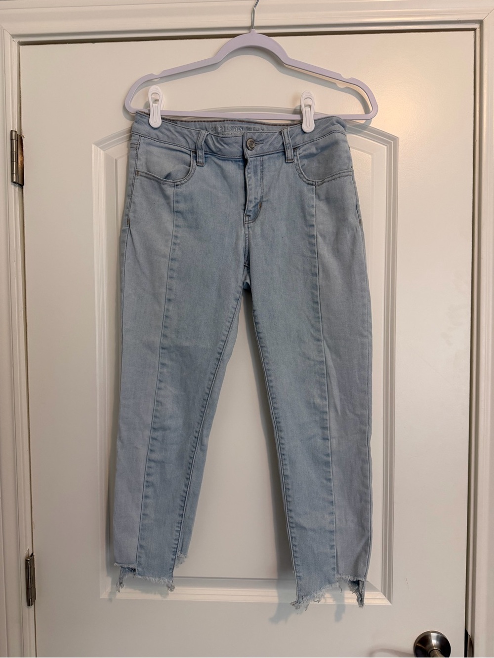 American Eagle Outfitters Light Blue Cropped Slim Jeans with Raw Hem